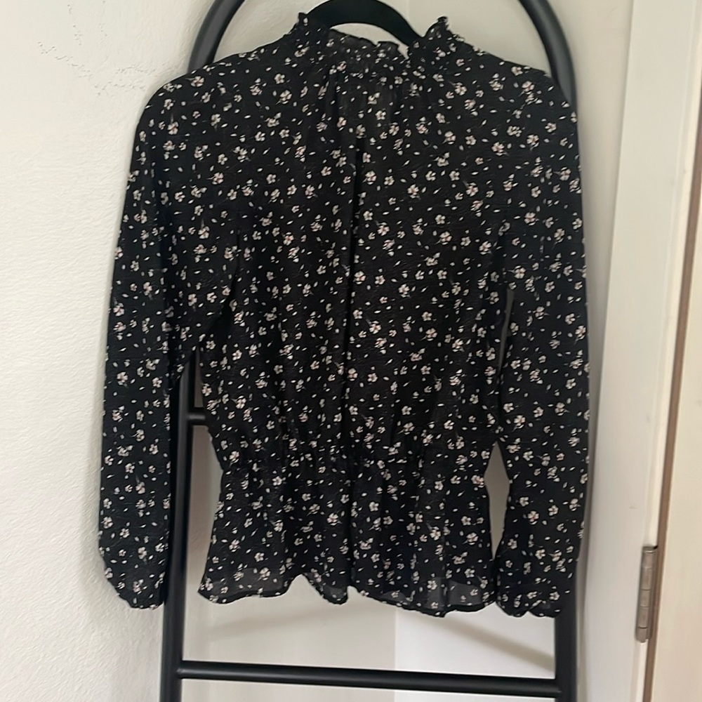 Stitched-waisted blouse. Missing one small button still in fantastic condition.